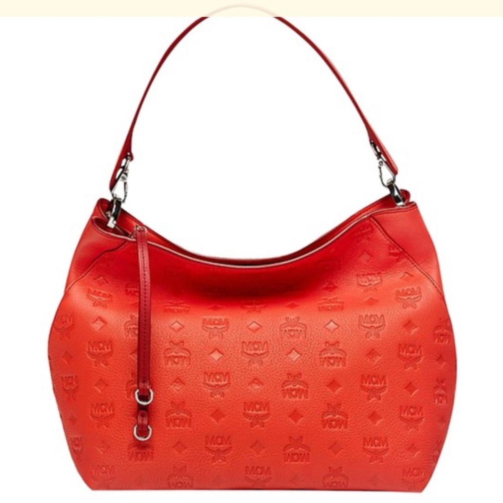 Orange Monogrammed Hobo Leather Klara MCM bag/crossbody 11’in L x 5’ W x 10’H